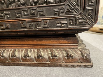 Un petit cabinet en bois sculpt&eacute; &agrave; d&eacute;cor de dragons, Chine, R&eacute;publique